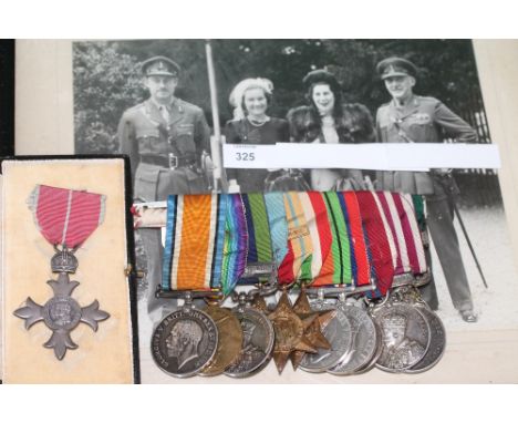 AN OFFICERS MBE-MSM GROUP OF THIRTEEN MEDALS. A cased MBE 2nd type, British War & Victory medals named to 147347 Gnr G Perry 