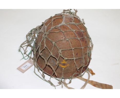 A JAPANESE NAVAL HELMET. Brought back from the War with the previous and following lots. A Helmet with Anchor device painted 