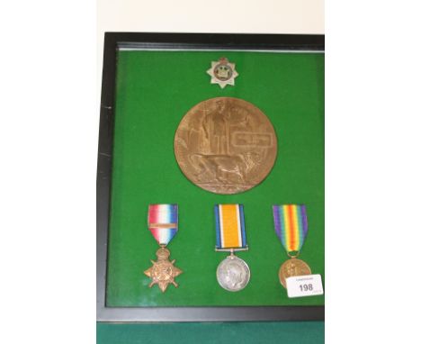A DEVONS 1914 CASUALTY TRIO & PLAQUE. A framed 1914 Star & Bar, British War & Victory Medals, named to 9708 Pte W R Clarke 1/