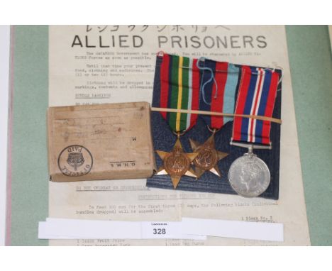 A PACIFIC STAR GROUP OF THREE TO A PRISONER OF WAR. Addressed box of issue and 1939/45-Pacific Star and War medals, awarded t