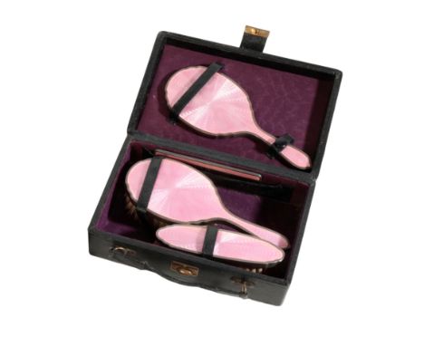 A  SILVER MOUNTED GUILLOCHE ENAMEL TRAVEL DRESS SET 20th century, stamped '925', the pink guilloche enamel with silver mounts