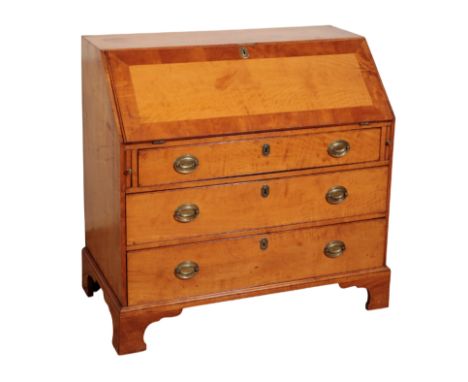 A GEORGE III SATINWOOD BUREAU the fall front opening to reveal a fitted interior, above graduating drawers, on bracket feet, 