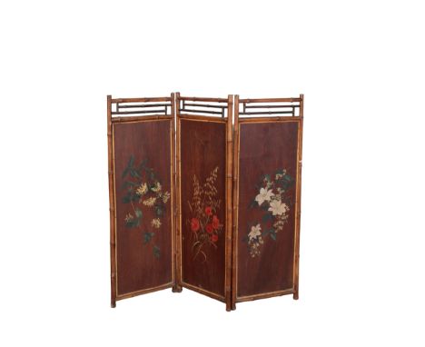 A PAINTED BAMBOO FOLDING SCREEN the front of each of the three panels painted with floral sprays, each panel 122cm high x 44c