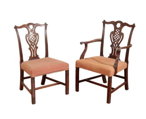 A SET OF EIGHT GEORGE III STYLE MAHOGANY DINING CHAIRS 19th century, after a design by Thomas Chippendale, with a shaped top 