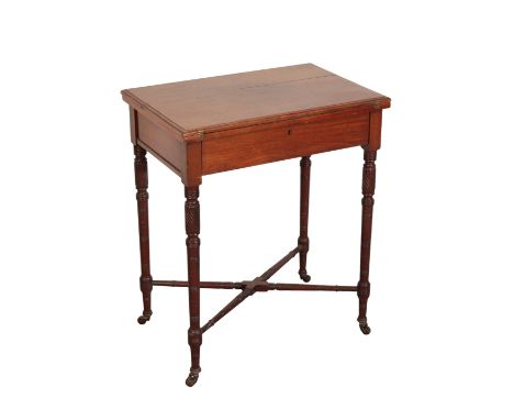 A 19TH CENTURY MAHOGANY WRITING TABLE BY JAMES SHOOLBRED &amp; CO. of rectangular form with a hinged top revealing a tooled l