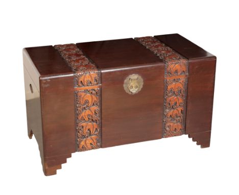 A CHINESE CAMPHOR WOOD CHEST 19th/20th century, of rectangular form carved with foliage, on stepped bracket feet, Width 100cm
