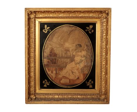 A REGENCY PAINTED SILK AND WOOLWORK EMBROIDERY Circa 1825, depicting a lady sitting in a garden holding an umbrella, with a v