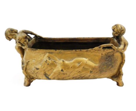 Charles Korschann (Czech 1872-1943). A bronzed planter embossed to one side with a naked figure, verso a landscape, surmounte
