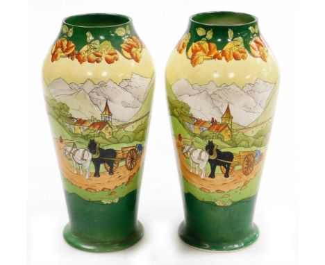A pair of early 20thC Frank Beardmore pottery vases, Sutherland Art Ware, decorated in The Two Horses pattern, printed marks,