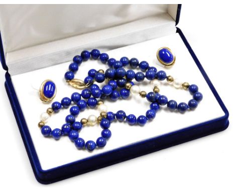 A lapis lazuli necklace and earring set, the necklace with lapis and pearl brakes, with a 9ct gold woven design clasp, and a 