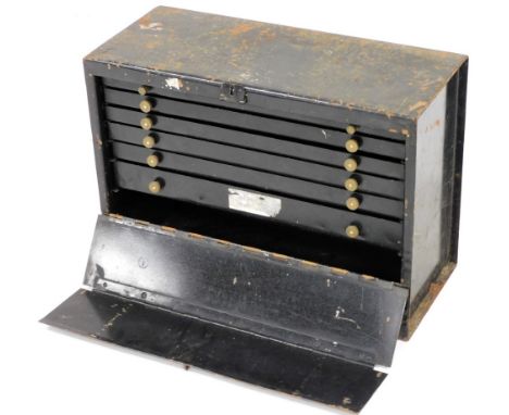 A metal tool chest, with a drop down front enclosing six graduated drawers, 54cm wide.