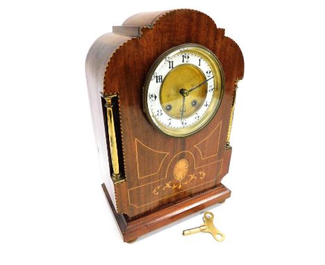A late 19thC French mahogany cased mantel clock, circular brass dial with enamel chapter ring bearing Arabic numerals, BHA ei