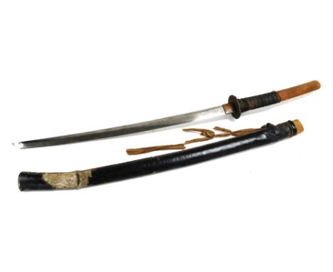 An early 20thC Japanese sword, in scabbard, blade 62.5cm wide. (AF) 