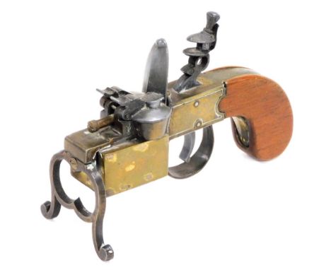 A Dunhill tinder pistol lighter, in brass with hardwood handle, provisional patent number 19273, registered number 7940, 14.5
