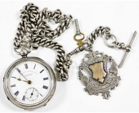 A J.G. Graves Sheffield The Express English Lever silver cased pocket watch, open faced, keywind, with a circular enamel dial