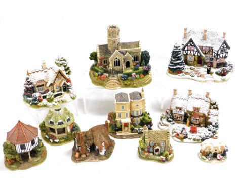 A group of Lilliput Lane cottages, to include The Three Kings, Lead Knightly Light, Christmas Lights At The Bell Inn, The Old