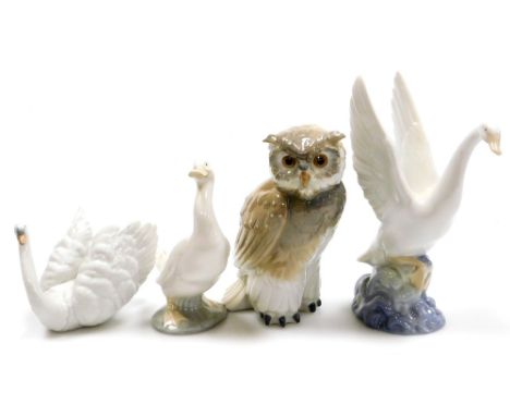 Three Nao porcelain bird figures, comprising owl, 17cm high, swan, 19cm high, goose, 15cm high and a Lladro swan, 10cm high, 