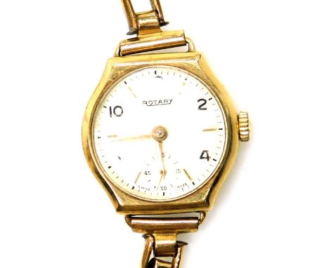 A Rotary 9ct gold lady's wristwatch, the watch head in a 9ct gold case with cream coloured dial and seconds dial, on a rolled