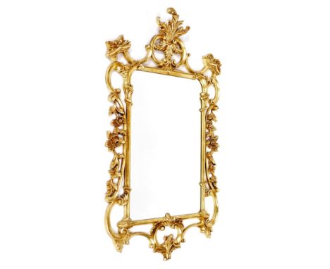 A 20thC Chinese Chippendale style gilt wall mirror, with pagoda and rococo scroll outer detailing, 107cm x 54cm.