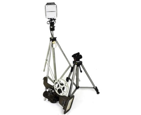 A Bell and Howell 8mm projector model 606M, Prinz Supa-lite 1000, on a Berkey Colortran tripod stand, and a Vanguard tripod s