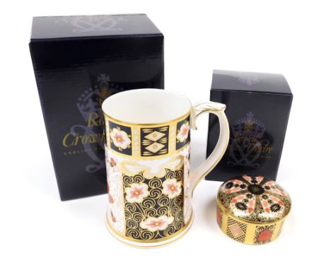 Two items of Royal Crown Derby porcelain, comprising a commemorative Millennium Imari tankard, in typical colourway and leaf 