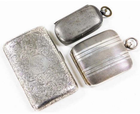 An Edward VII silver cigarette case, decorated profusely with scrolls, the central cartouche bearing monogram and date 1907, 