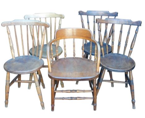 A harlequin set of four oak and elm stick back kitchen chairs, together with an oak office chair. (5)