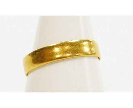 A 22ct gold wedding band, of plain design, London 1967, ring size P½, 2g all in.