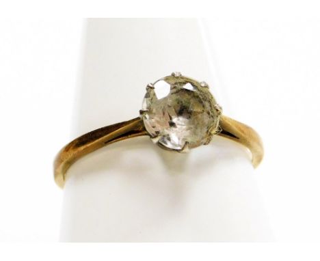 A 9ct gold and silver dress ring, set with white paste stone in floral setting, ring size R½, 1.8g all in.