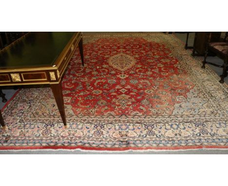 Mahal carpet, West Iran, the strawberry field of vines around a medallion enclosed by spandrels and ivory borders, 440cm by 3