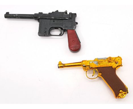 Crescent Toys &amp; Lonestar vintage cap guns including: (1) Luger, by Crescent toys, gold (peeled away in some areas), (2) T