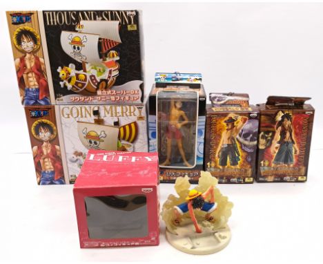 Banpresto One Piece Pirates collectibles group including: Going Merry, Thousand Sunny, 1/8 Luffy, The Grandline Men Volume 1 
