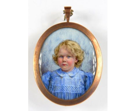 ENGLISH SCHOOL, CIRCA 1910, PORTRAIT MINIATURE OF A YOUNG GIRL IN A BLUE SMOCK, IVORY, OVAL, 5.5CM X 4.2CM, GILTMETAL FRAME