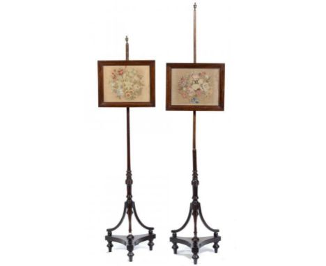 A PAIR OF VICTORIAN MAHOGANY POLE SCREENS , LATE 19TH C  with floral wookwork banner, brass finial, 146cm h  ++Some old small
