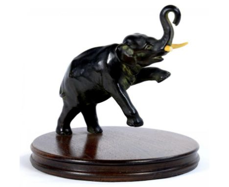 A JAPANESE BRONZE SCULPTURE OF A REARING ELEPHANT, 15CM, MEIJI PERIOD, ON LATER AFFIXED WOOD BASE