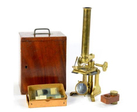 A VICTORIAN BRASS MICROSCOPE IN FITTED MAHOGANY CASE, 22CM H AND A QUANTITY OF CONTEMPORARY MICROSCOPE SLIDES