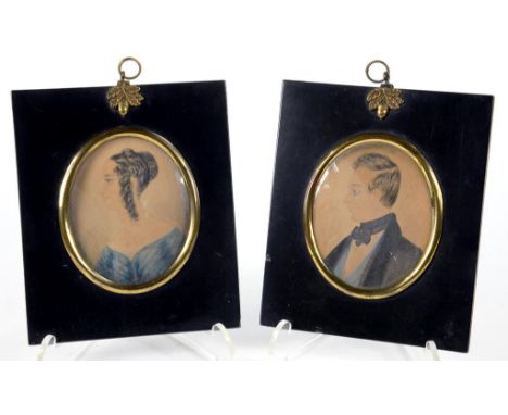 ENGLISH NAIVE ARTIST, EARLY 19TH CENTURY - PORTRAIT MINIATURES OF A LADY AND GENTLEMAN IN PROFILE,WATERCOLOUR ON CARD, OVAL, 