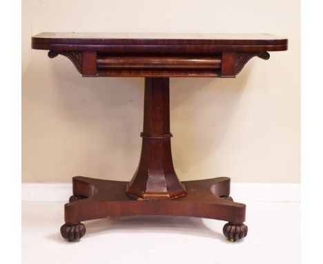 Victorian mahogany rectangular fold over top card table, standing on a splayed octagonal pillar and quadripartite platform ba