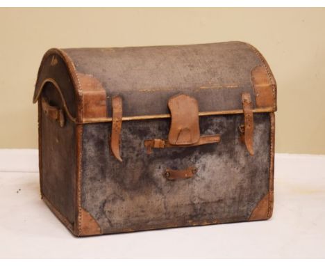 Early 20th Century leather mounted canvas bound dome top trunk   Condition: 