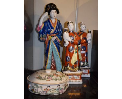 Three Oriental porcelain enamel decorated figures of females, together with a circular pot and cover   Condition: 