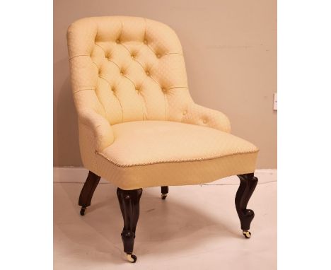 Victorian spoon back drawing room chair upholstered in pale yellow button back fabric and standing on cabriole supports   Con