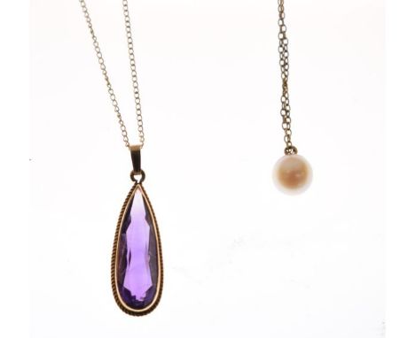 Pearl set pendant and a tear drop shaped amethyst pendant, each set on a fine chain   Condition: 