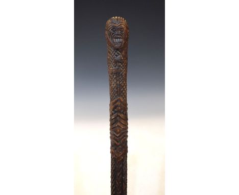 Unusual Ethnic carved walking stick, the handle formed as a warrior clutching an axe   Condition: 