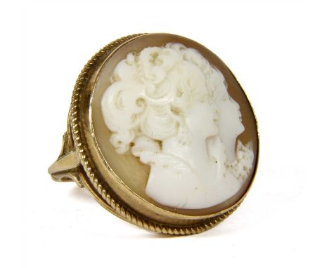 A 9ct gold shell cameo ring, with two female profiles, London 1974, 9.41g, size S½