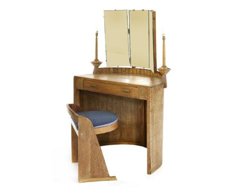 An Art Deco limed oak dressing table and stool, attributed to Ernest Gomme, the triptych mirrors flanked with integral candle