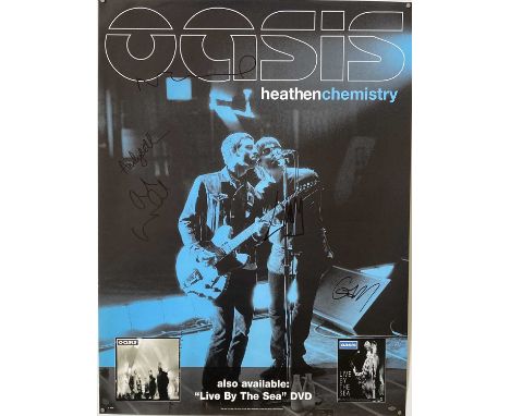 SIGNED OASIS POSTER. A 'Heathen Chemistry' poster signed by Liam and Noel Gallagher, Gem Archer, Andy Bell. Measures 18 x 24"