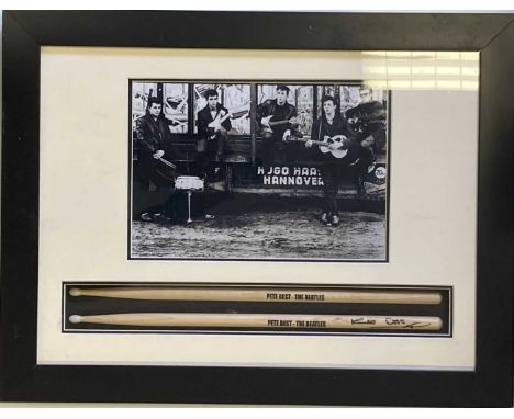 PETE BEST SIGNED DRUM STICK AND BEATLES BOOKS AND MEMORABILIA. Beatles memorabilia to include: framed display with a drumstic