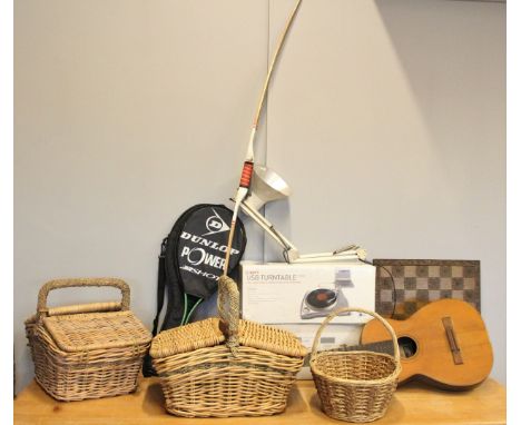 A pair of Harrods picnic baskets, with leather strapping and tags, together with a carved wood chess board, decorated with a 