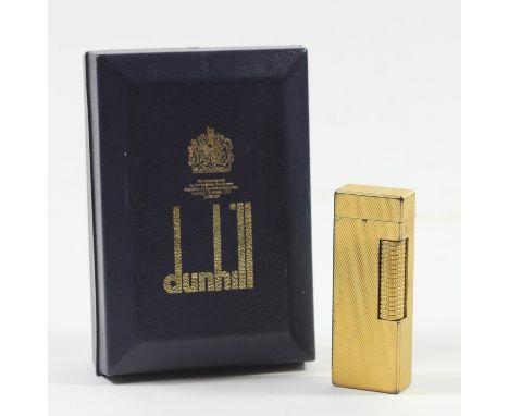 Dunhill, a vintage Rollagas engine turned gold plated lighter, engine turned decoration, instructions, case 