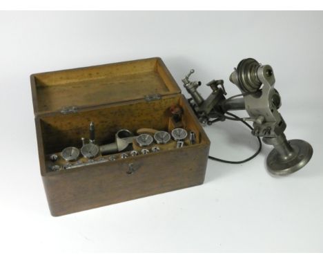 A watchmakers 6mm lathe with cross slide collets and other precision tools and attachments. 